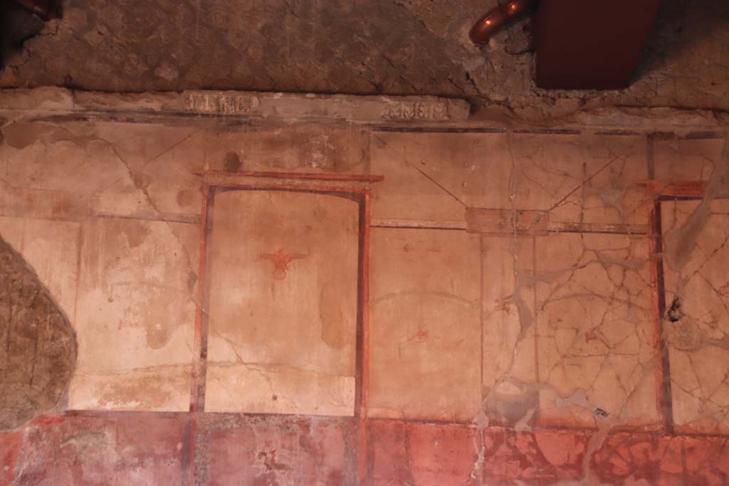 V.15 Herculaneum, October 2020. Looking towards painted decoration from upper centre of east wall of atrium. Photo courtesy of Klaus Heese.