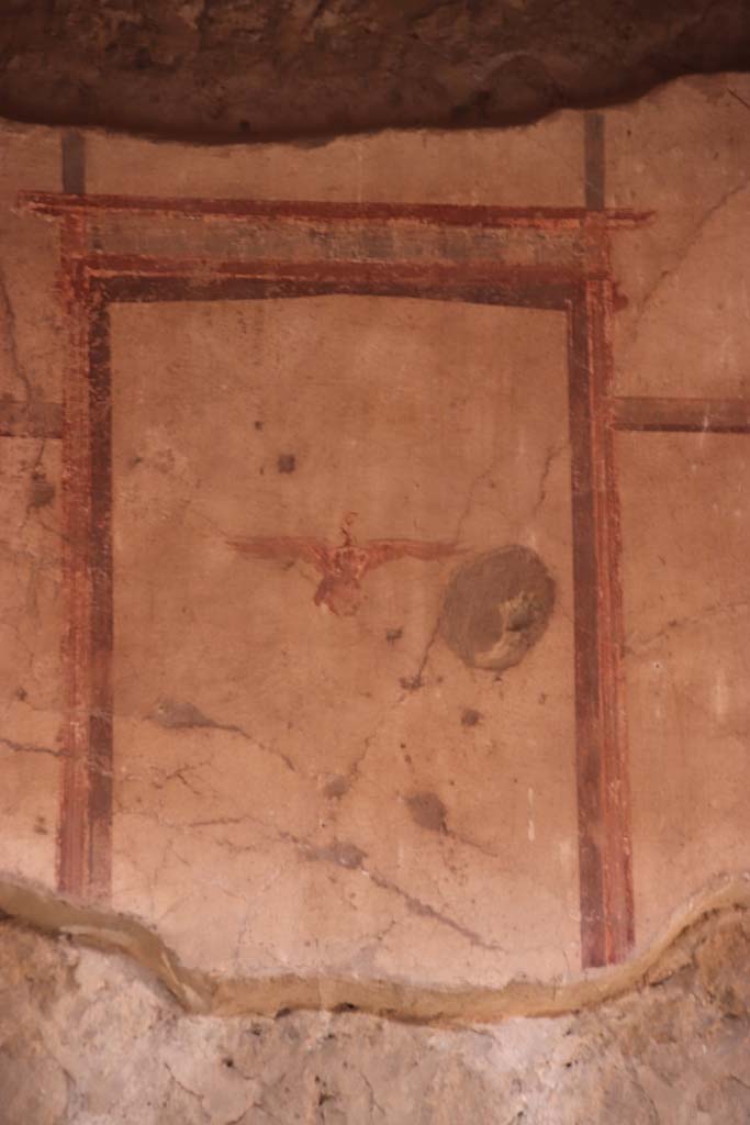 V.15, Herculaneum. October 2020. 
Upper painted detail from centre of west wall in atrium. Photo courtesy of Klaus Heese.

