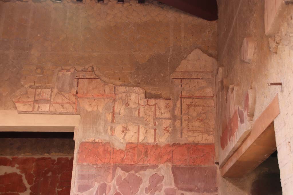 V.15 Herculaneum, October 2020. Painted panel from upper south wall of atrium, above west side of doorway to tablinum. Photo courtesy of Klaus Heese.