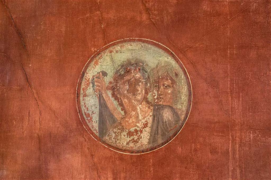 V.15 Herculaneum. 2004. South end of west wall of tablinum. Medallion with painting of bacchante and young satyr.
