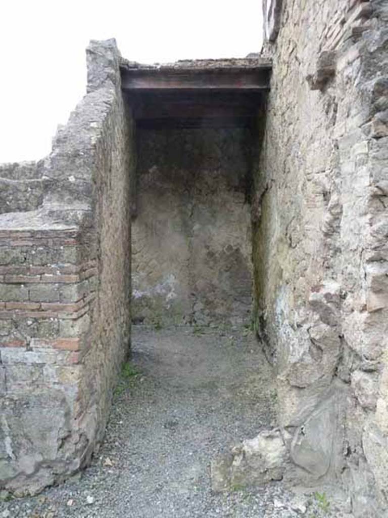 V, 21, Herculaneum. May 2010. Looking south to small room in south-west corner of shop.