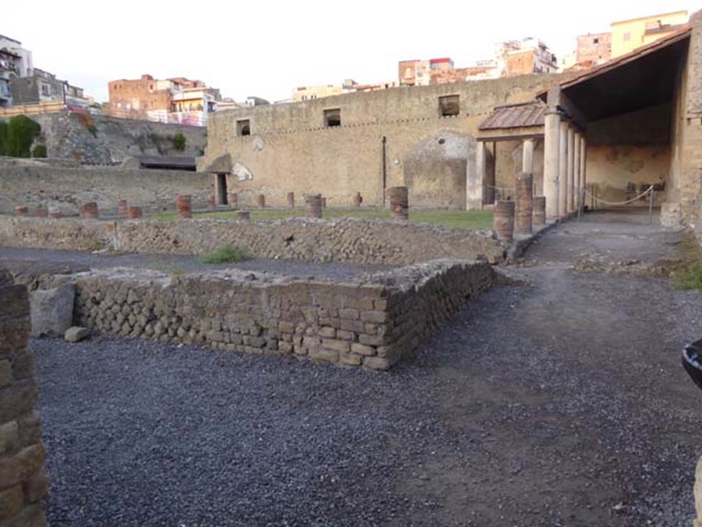 VI.5, Herculaneum. September 2015. Central Baths, doorway leading to open-exercise area, at front of photo.  Photo courtesy of Michael Binns.
