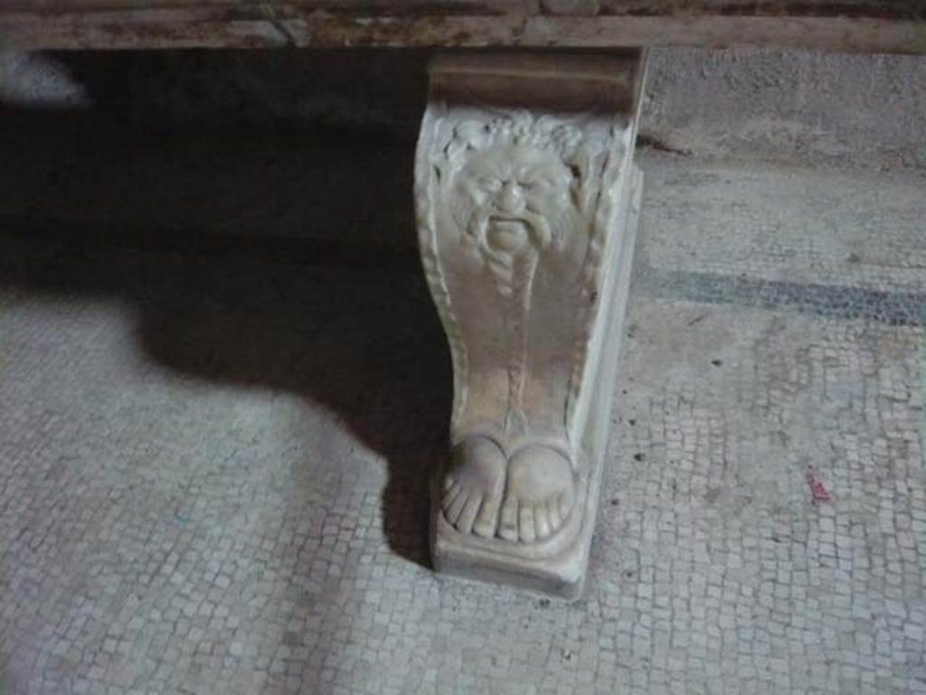 VI.8, Herculaneum. August 2013. Leg of marble bench on east side of hot-room.
Photo courtesy of Buzz Ferebee.
