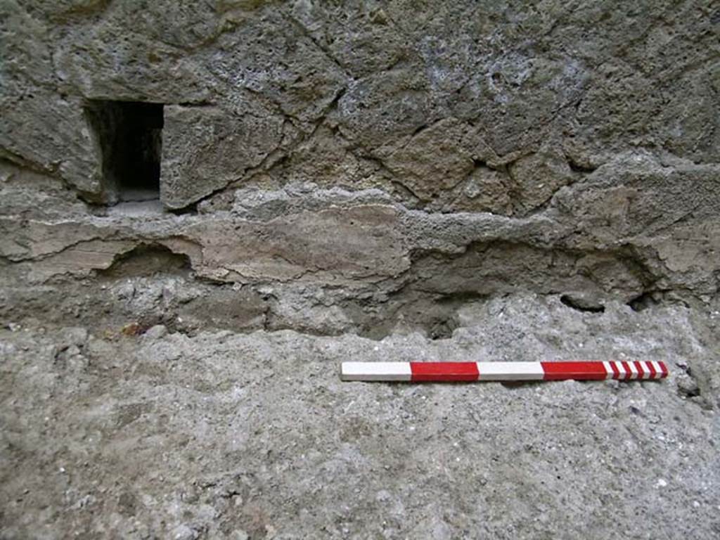 VI.12, Herculaneum. September 2004. Detail of investigation near east wall. Photo courtesy of Nicolas Monteix.