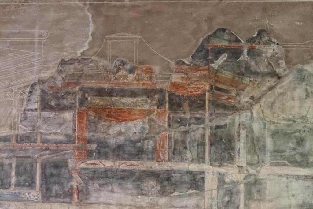 VI.13, Herculaneum, April 2018. Detail of painted decoration on upper west wall. Photo courtesy of Ian Lycett-King.  Use is subject to Creative Commons Attribution-NonCommercial License v.4 International.
