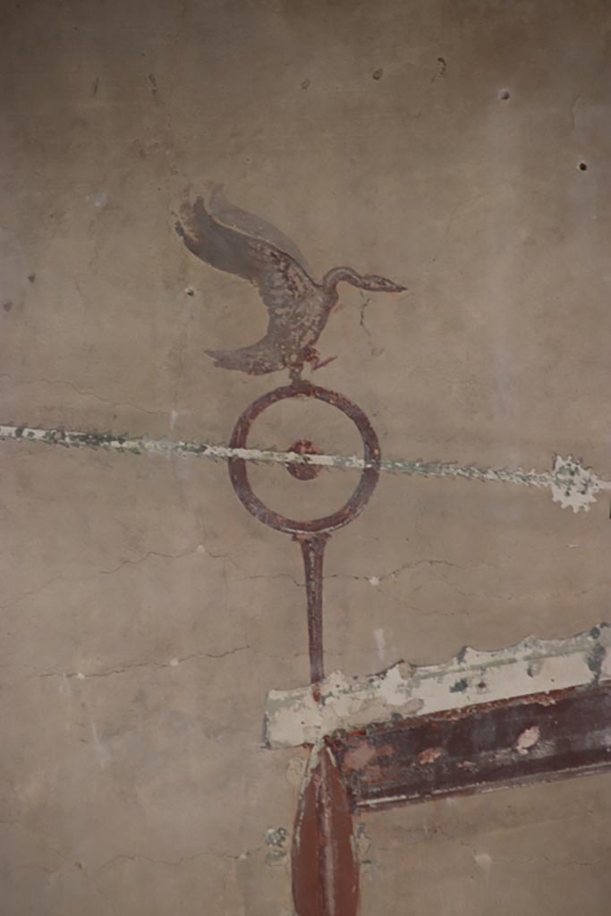 VI.13 Herculaneum. October 2022. 
Room 16, detail of painted decoration from south wall at east end. Photo courtesy of Klaus Heese.
