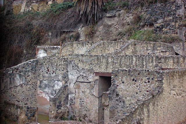 VI.13/11, Herculaneum. Not dated. 
Looking towards blocked doorway in north wall of atrium, whch would have led into the shop-room of VI.14.
Photo courtesy of Nicolas Monteix.
