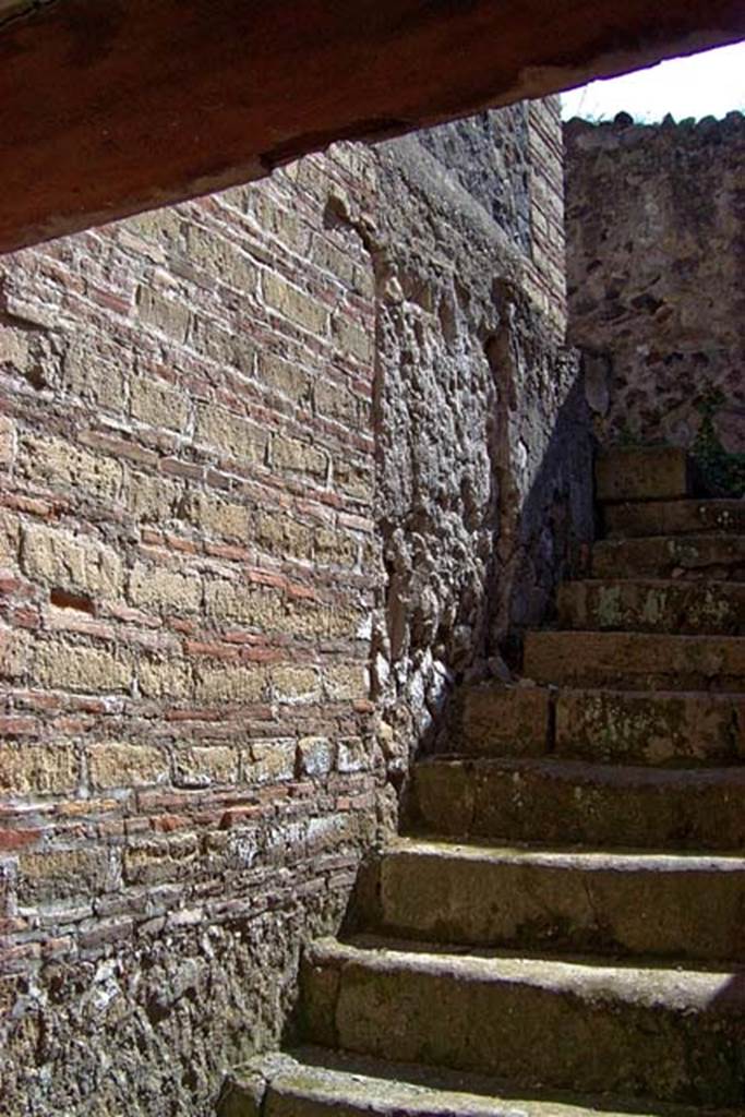 VI.17, Herculaneum. July 2003. Stairs against north wall. Photo courtesy of Nicolas Monteix.