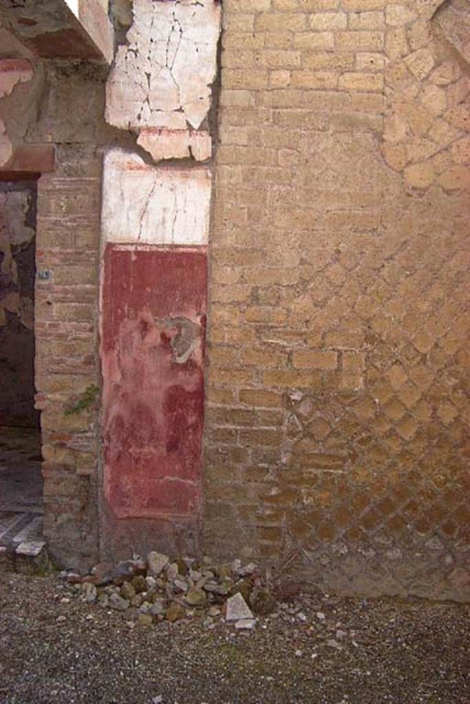 VI.17, Herculaneum. Not dated. 
Remains of painted decoration on east wall of peristyle, near doorway to cubiculum 11. 
Photo courtesy of Nicolas Monteix.
