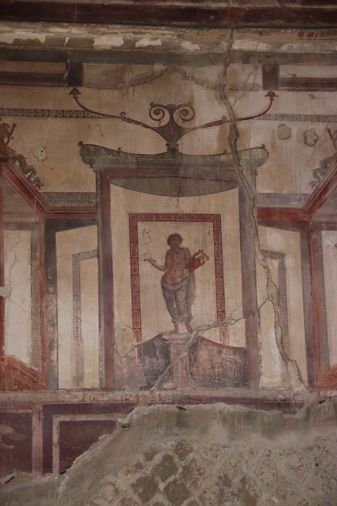 VI.17 Herculaneum. September 2019. 
Detail of central figure on north wall of triclinium 13. Photo courtesy of Klaus Heese.
