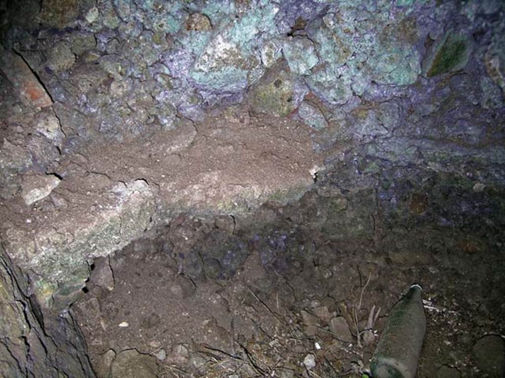 VI.17, Herculaneum. May 2004. Collapsed cistern/tank, below flooring (50cms). Photo courtesy of Nicolas Monteix.


