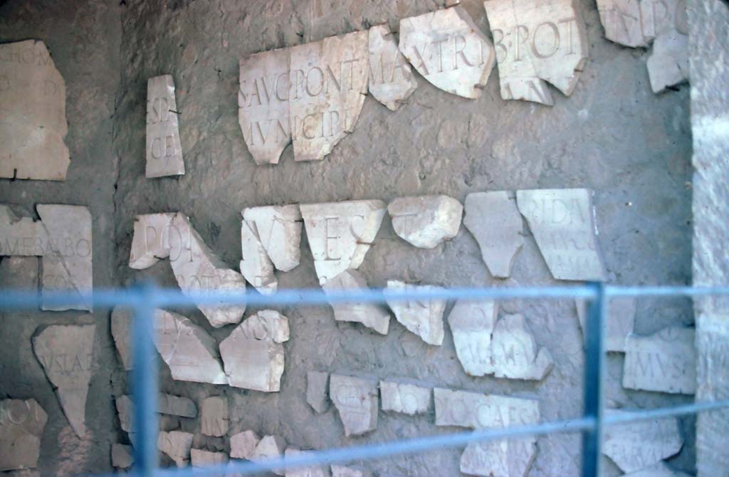 Fragments of inscription commemorating the reconstruction by Emperor Vespasian. Photo taken 7th August 1976.
Photo courtesy of Rick Bauer, from Dr George Fay’s slides collection.

