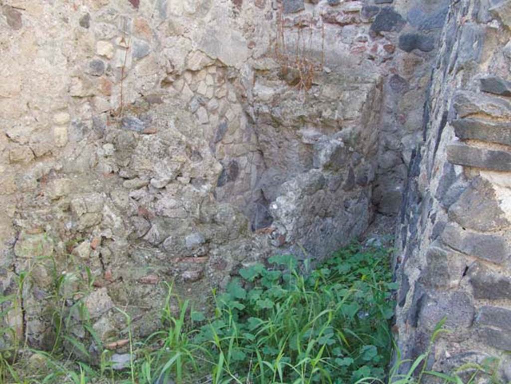 VII.6, Herculaneum. September 2015. Looking towards north side, still unexcavated, from entrance doorway.  Photo courtesy of Michael Binns.
