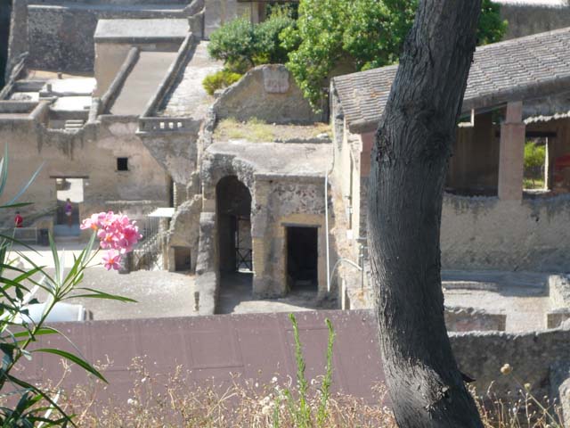 Ins. Orientalis I, 1a, Herculaneum, June 2019. 
Looking north from access roadway towards lower floor rooms opening south onto a vaulted corridor.
The upper floor rooms belong to the south end of the House of the Gem.
Photo courtesy of Buzz Ferebee.

