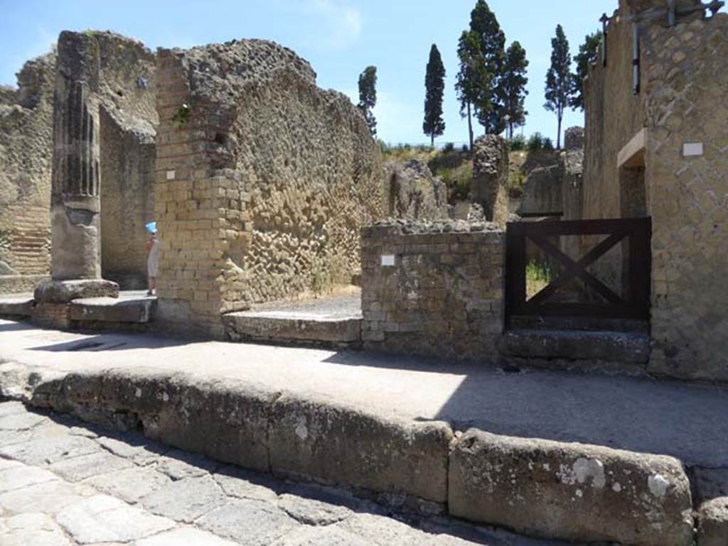 Ins.Or.II.2, on right, Herculaneum, July 2015. Looking east to entrance doorways.
Photo courtesy of Michael Binns.
