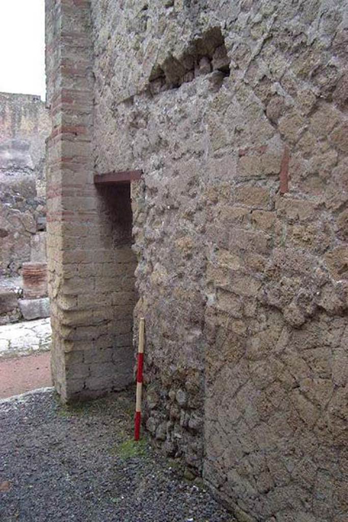 Ins. Or II, 12 Herculaneum. January 2002. 
Looking towards west end of north wall, with doorway to latrine just inside entrance doorway. 
Photo courtesy of Nicolas Monteix.
