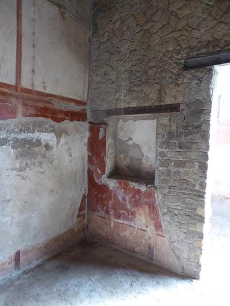 IV.4, Herculaneum, October 2014. 
Room 4, square recess in east wall of cubiculum with doorway to small courtyard 3. 
Photo courtesy of Michael Binns.

