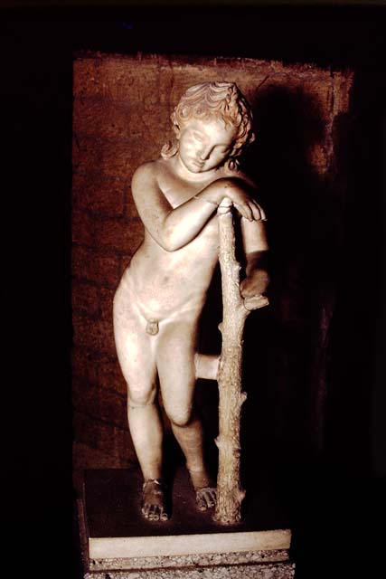 Herculaneum, 1978. Statue now seen on the memorial altar of Marcus Nonius Balbus.  
Photo by Stanley A. Jashemski.   
Source: The Wilhelmina and Stanley A. Jashemski archive in the University of Maryland Library, Special Collections (See collection page) and made available under the Creative Commons Attribution-Non-Commercial License v.4. See Licence and use details.
J78f0513

