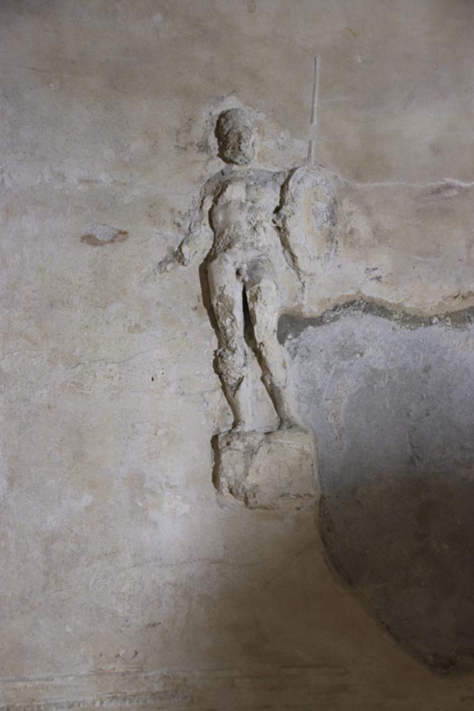 Herculaneum Suburban Baths. October 2025. 
Tepidarium, stucco warrior from centre of east wall. Photo courtesy of Klaus Heese.

