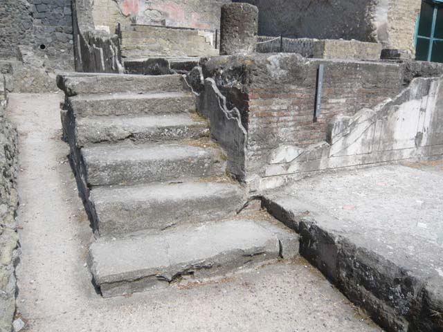 Herculaneum, August 2013. Sacred Area terrace, looking north towards steps to the shrine of the Four Gods. Photo courtesy of Buzz Ferebee.

