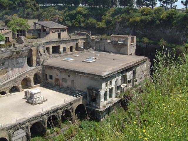 Herculaneum, June 2011. Looking north from access roadway towards the “tower” room of the House of Relief of Telephus, in centre. Note Vesuvius peeking over the site, centre top.  Photo courtesy of Sera Baker.

