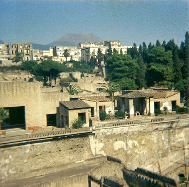 Herculaneum, May 2007. Looking north towards the Terrace of Balbus, centre, with east end of arched openings described as boat-sheds below it. Photo courtesy of Buzz Ferebee.
