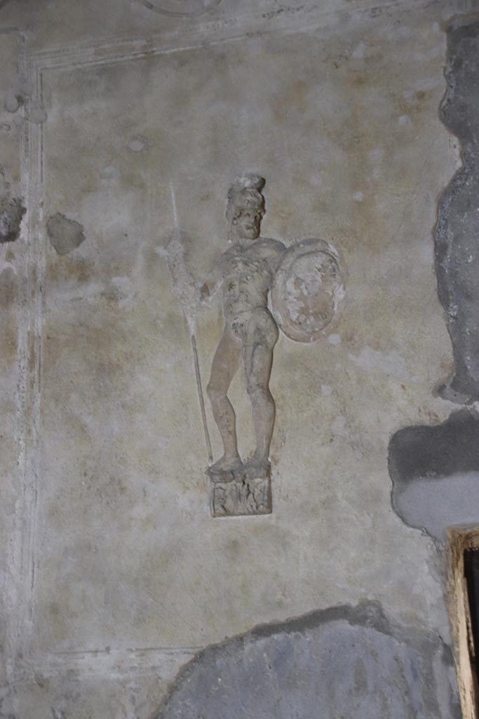 Herculaneum Suburban Baths. October 2025. 
Tepidarium, detail of stucco warrior from west side of north wall. Photo courtesy of Klaus Heese.
