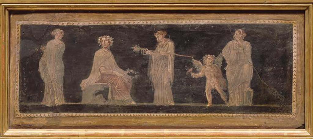 Ercolano Casa vicino al Teatro or Herculaneum House near the Theatre. Painting of a Bacchic ceremony.
A woman looking back towards a seated woman wearing an ivy crown and holding a myrtle crown, woman holding a thyrsus, a cupid holding a lit torch and a woman standing with a foot on a stool.
Now in the Louvre. Inventory number P28. 
See Antichità di Ercolano: Tomo Secondo: Le Pitture 2, 1760, p. 141, Tav. XXIII.
