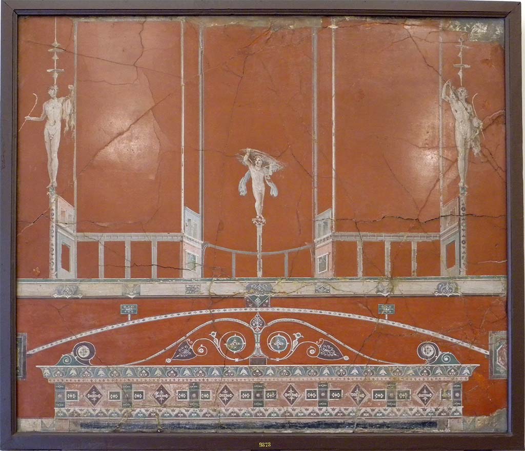 Ercolano Casa vicino al Teatro or Herculaneum House near the Theatre. Architectural painting with satyrs.
Now in Naples Archaeological Museum. Inventory number 9878.
Photo courtesy of Raffaele Prisciandaro.
See Grimaldi, M. (2021). The Painters of Pompeii. (MondoMostre, Rome), page 64/65, fig.3. House near Theatre, NAP 9878
See Bragantini, I and Sampaolo, V., Eds, 2009. La Pittura Pompeiana. Verona: Electa. P. 257.


