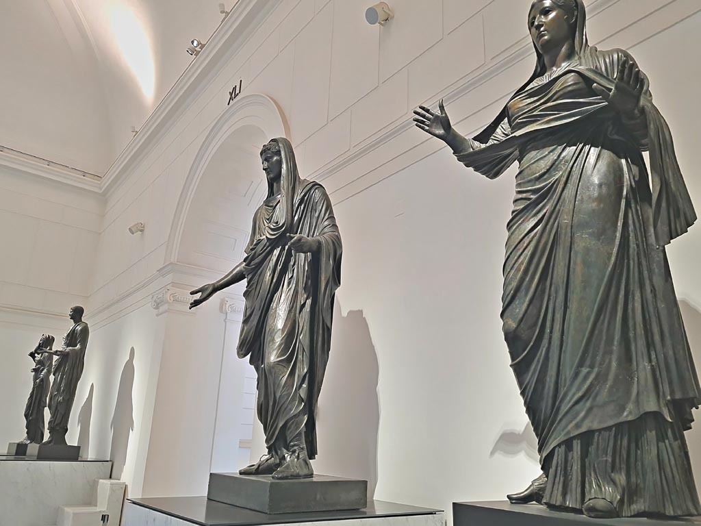 Herculaneum theatre. April 2023. Bronze statues in “Campania Romana” gallery. Photo courtesy of Giuseppe Ciaramella.