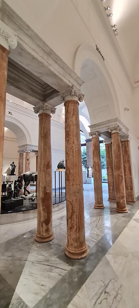 Naples Archaeological Museum, April 2023.
Looking through beautiful marble columns and pilasters, part of the “Campania Romana” gallery, towards the display of Bronze Horses.
Photo courtesy of Giuseppe Ciaramella.
