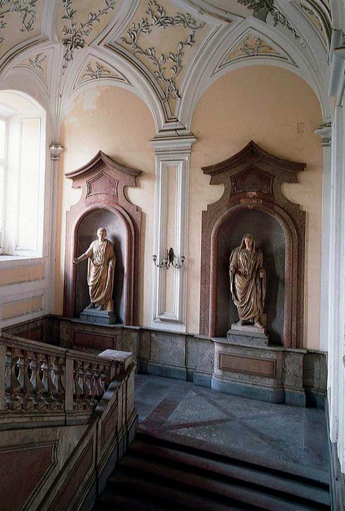 Herculaneum Theatre. Two statues possibly from the Theatre now on the staircase at the Royal Palace of Portici.
Photo courtesy of Davide Peluso.

