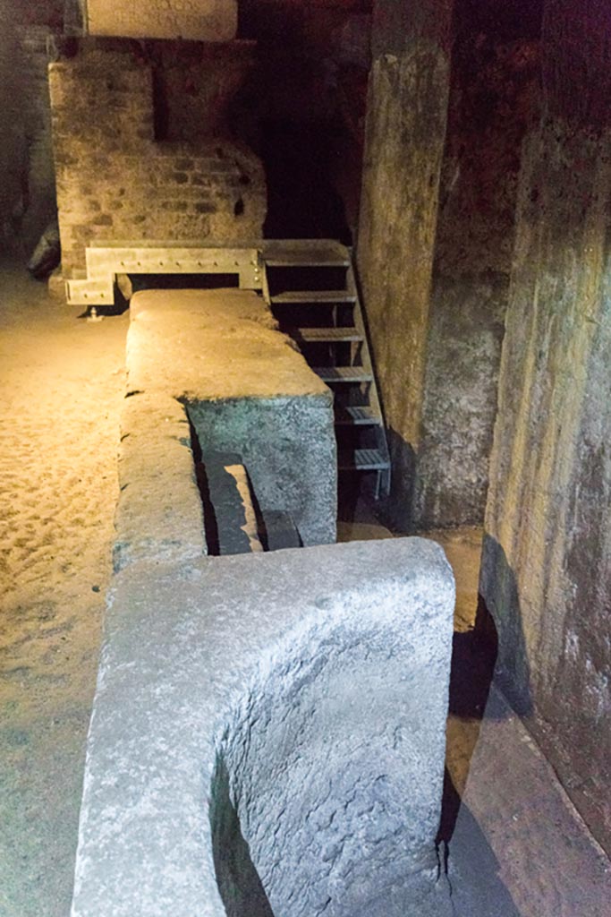 Herculaneum Theatre. October 2023. 
Front of east end of proscenium with square and round niches. Photo courtesy of Johannes Eber. 

