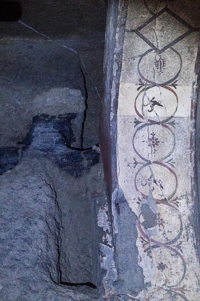 Herculaneum Theatre. October 2023. East Parascenium, detail of decoration of arch.
Photo courtesy of Johannes Eber. 

