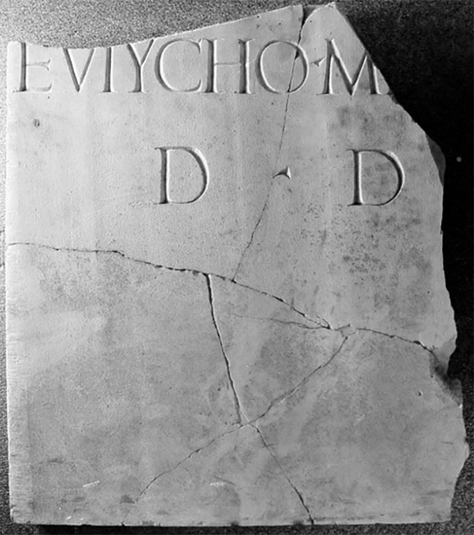 Third part of the Herculaneum funerary dedication to Marcus Nonius Eutychus Marcianus.
Now in Naples Archaeological Museum. Inventory number 3757c.

According to the Epigraphic Database Roma the full inscription reads
M(arco) Nónio [Ba]ḷbì l(iberto)
Eutycho Marcian(o)
d(ecreto) d(ecurionum)      [CIL X, 1472]

