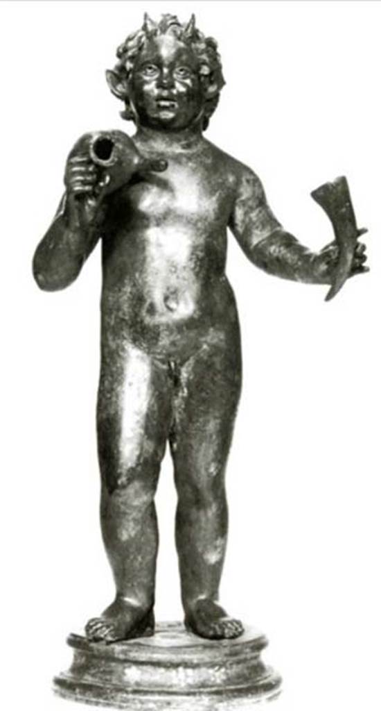 Villa dei Papiri, Herculaneum. Atrium. Bronze statue of Silenus with wineskin and drinking horn in left hand found in 1754 round the impluvium.
Now in Naples Archaeological Museum. Inventory number 5033.
