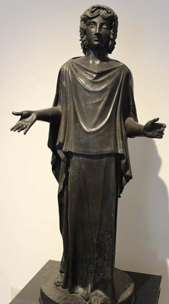 Villa dei Papiri, Herculaneum. Bronze statue of a Peplophoros or Hypermnestra or dancer or praying child. 
Found in 1754, north west corner of garden.
Now in Naples Archaeological Museum. Inventory number 5603.
Photo courtesy of Miguel Hermoso Cuesta. Own work. Wikimedia CC by SA 3.0 licence

