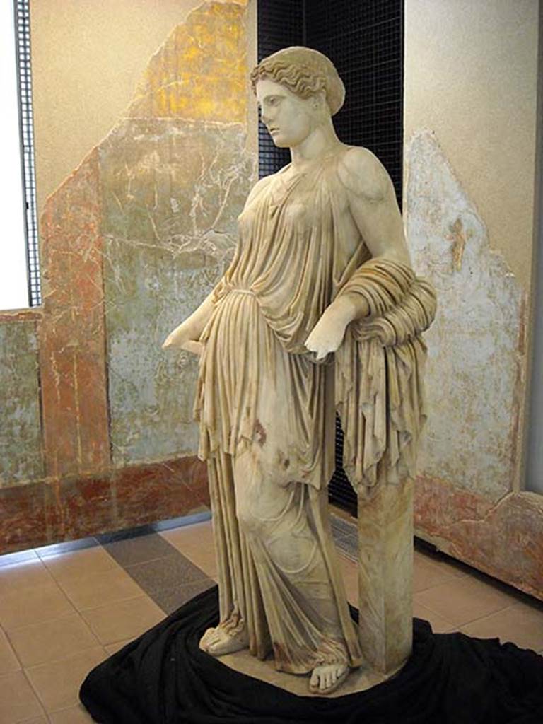 Villa dei Papiri, Herculaneum. March 2014. 
Peplophoros/Hera/Demeter statue found in area of collapsed “monumental structure”.
The statue is of white marble and shows numerous traces of its original polychromy.
Herculaneum inventory number 81595.
See Guidobaldi, M.P. and Esposito D., 2013. Herculaneum: Art of a Buried City. New York: Abbeville Press, p. 98, fig. 80.
Photo © Carlo Raso.
