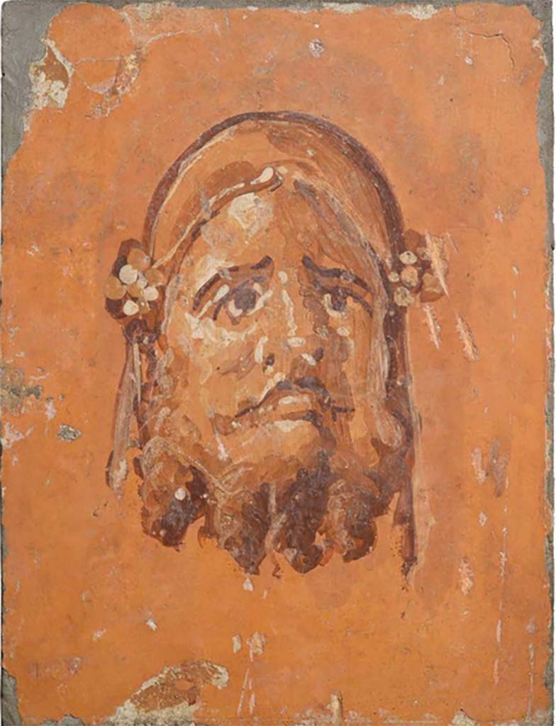Villa dei Papiri, Herculaneum. Painted plaster fresco of head of Silenus. (26 x 19.5cm)
Now in Naples Archaeological Museum. Inventory number 8821A. 
According to the Catalogue –
The above fresco, together with another two depicting monochrome heads floating on a yellow background have all been attributed to the Villa.
These were found between June 15th and June 22nd 1755.
See Catalogue (p.226-229) of exhibition entitled “Buried by Vesuvius, the Villa dei Papiri at Herculaneum”, edited by Kenneth Lapatin.
