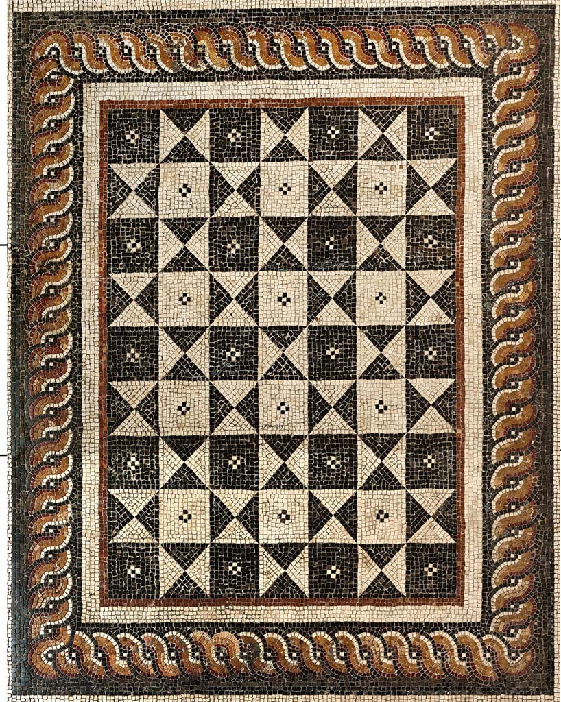 No.1 - Detail of central mosaic in photo above.
“A Second Style composite pavement at Portici in opus tessellatum consisting of 63 squares (7 x 9) of alternating positive and negative geometrical space in black and white tesserae, creates the optical illusion of superimposed rotated dotted squares.
The central panel is surrounded by a long band of braided guilloche in white, yellow and red on a black background.”
See Papaccio, V. The floors of the Villa dei Papiri. (p.56-63, of Buried by Vesuvius, the Villa dei Papiri at Herculaneum, edited by Kenneth Lapatin). 
Photographed at Reggia di Portici, October 2013. Mosaic pavements in Royal Apartments. 
Photo courtesy of Frédérique Marchand-Beaulieu and Helen Dessales.
©Villa Diomedes Project, Image database, http://villadiomede.huma-num.fr/bdd/images/5292 
