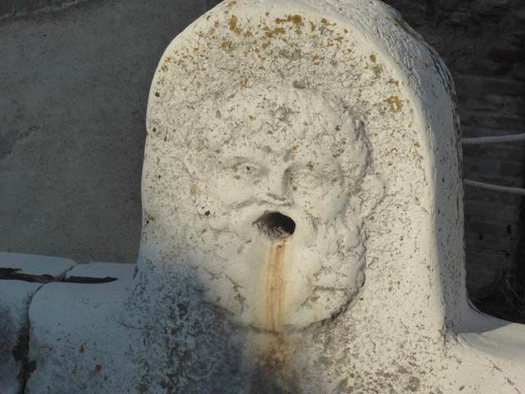 Decumanus Maximus, Herculaneum, September 2015. Fountain decorated with head of Hercules, from fountain on east side of the Decumanus Maximus.
