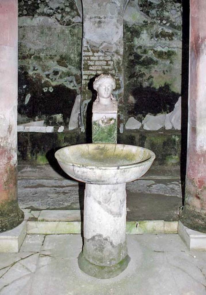 Fountain bust of Apollo, Suburban baths, Herculaneum. October 2001. Looking north at fountain bust of Apollo in the atrium. 
Photo courtesy of Peter Woods.

