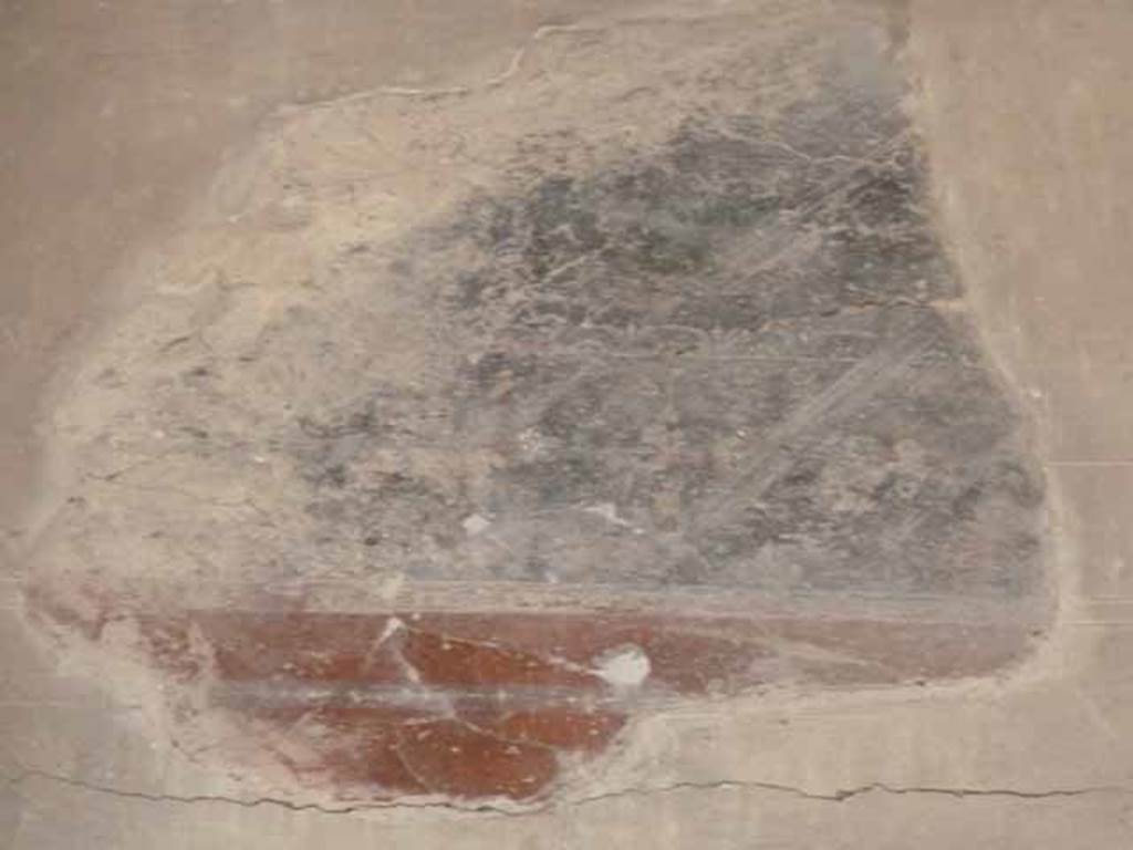 V.1 Herculaneum. May 2010. Atrium, painted decoration from north end of upper west wall.