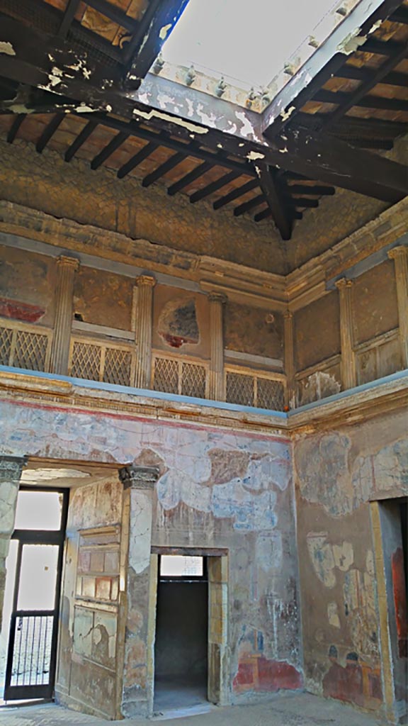 V.1 Herculaneum, photo taken between October 2014 and November 2019.
Looking towards west wall and north-west corner of atrium, with compluvium in roof.
Photo courtesy of Giuseppe Ciaramella.